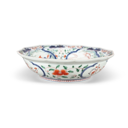 80 - A JAPANESE IMARI PATTERN KOI BOWL, 19TH CENTURY,   of circular shape with angled rim, painted and en... 