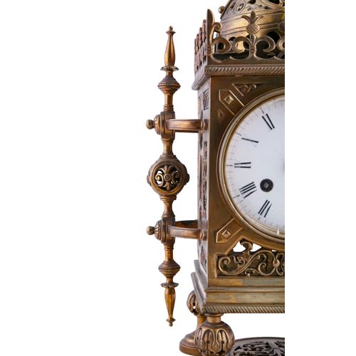 85 - A FRENCH GOTHIC REVIVAL BRASS CASED MANTLE CLOCK LATE 19TH CENTURY,   with pierced dome mount above ... 