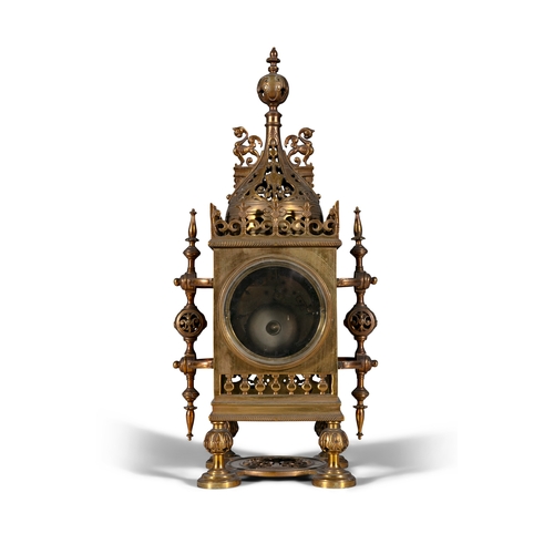 85 - A FRENCH GOTHIC REVIVAL BRASS CASED MANTLE CLOCK LATE 19TH CENTURY,   with pierced dome mount above ... 