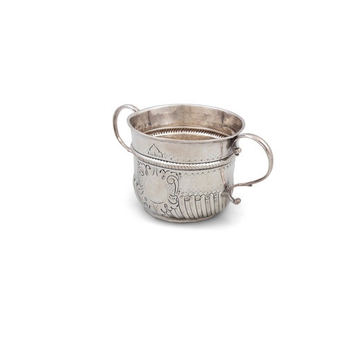 92 - A QUEEN ANNE SILVER TWO-HANDLED PORRINGER  London, c.1706, makers mark partially rubbed, of circular... 