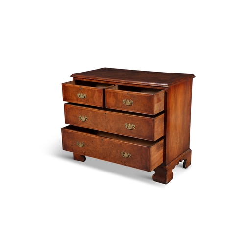 17 - A WALNUT CHEST OF DRAWERS 19TH CENTURY,  the rectangular quarter-veneered top with thumb moulded edg... 