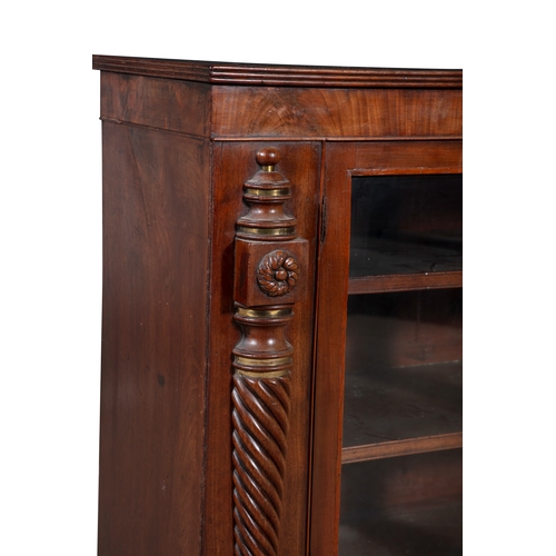 22 - A WILLIAM IV MAHOGANY AND ROSEWOOD BANDED RECTANGULAR SIDE CABINET,  with twin glazed doors and spir... 