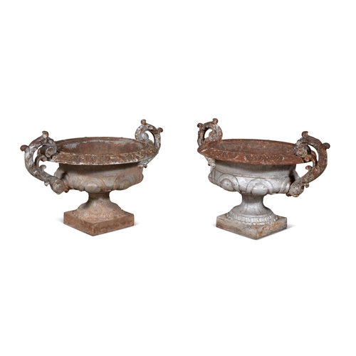 3 - A PAIR OF SILVER PAINTED CAST IRON GARDEN URNS, 19TH CENTURY  of small proportions, campagna form wi... 