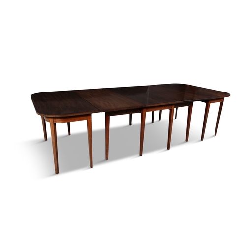 498 - A MAHOGANY EXTENDING DINING TABLE 19TH CENTURY,  of rectangular form, with rounded corners with gate... 