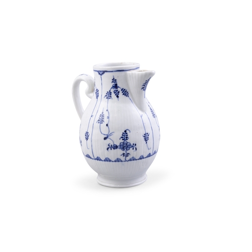 506 - A COLLECTION OF FOUR PORCELAIN PIECES,  comprising a jug, two tea bowls and a saucer. Jug 18.5cm hig... 