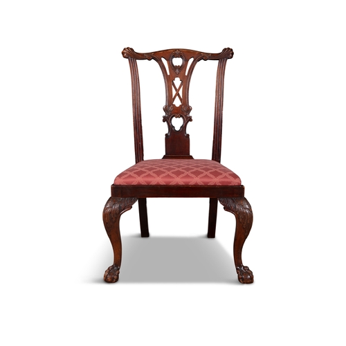 507 - A SET OF SIX IRISH CARVED MAHOGANY DINING CHAIRS  following the general design of the Malahide Castl... 