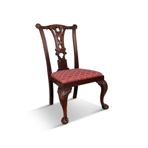 507 - A SET OF SIX IRISH CARVED MAHOGANY DINING CHAIRS  following the general design of the Malahide Castl... 