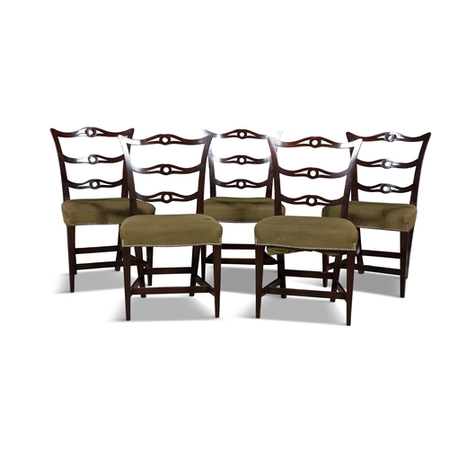 508 - A SET OF FIVE MAHOGANY FRAMED DINING CHAIRS IN THE CHIPPENDALE STYLE   the pierced carved ladder bac... 