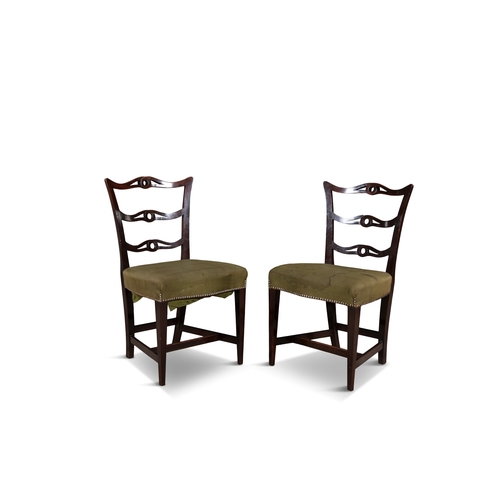 508 - A SET OF FIVE MAHOGANY FRAMED DINING CHAIRS IN THE CHIPPENDALE STYLE   the pierced carved ladder bac... 