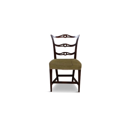 508 - A SET OF FIVE MAHOGANY FRAMED DINING CHAIRS IN THE CHIPPENDALE STYLE   the pierced carved ladder bac... 