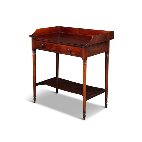 509 - AN EARLY VICTORIAN MAHOGANY COMPACT WASHSTAND CIRCA 1840,  of rectangular form with raised three-qua... 