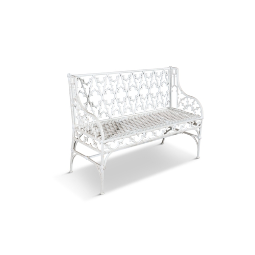 8 - A VICTORIAN WHITE PAINTED CAST-IRON THREE-SEATER GARDEN BENCH,  in the Gothic style with open tracer... 