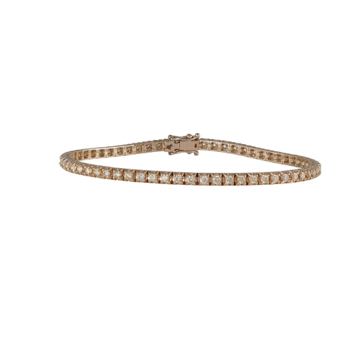 108 - A DIAMOND LINE BRACELET  Composed of sixty-two brilliant-cut diamonds, claw-set in square-shaped mou... 