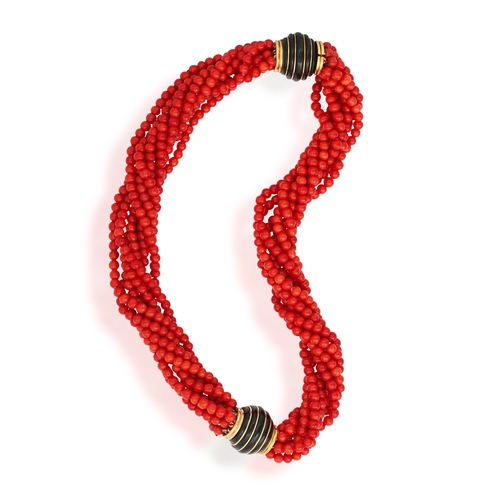 124 - TRIO: A CORAL AND ONYX NECKLACE/BRACELETS  Composed of eight strands of corallium rubrum coral beads... 