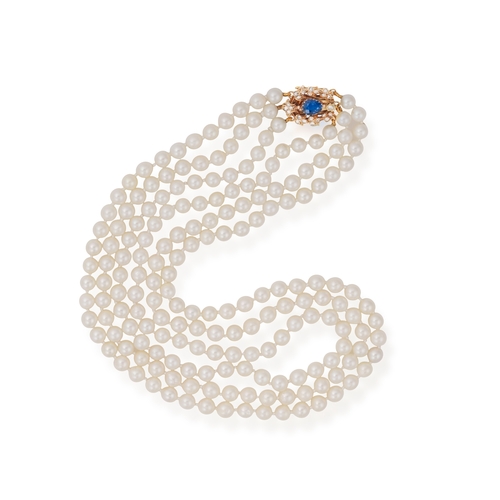 141 - A CULTURED PEARL, SAPPHIRE AND DIAMOND NECKLACE  Composed of three strands of round-shaped cultured ... 