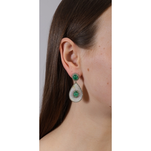 149 - A PAIR OF MOTHER-OF-PEARL, EMERALD AND DIAMOND PENDENT EARRINGS  Each pear-shaped mother-of-pearl pl... 