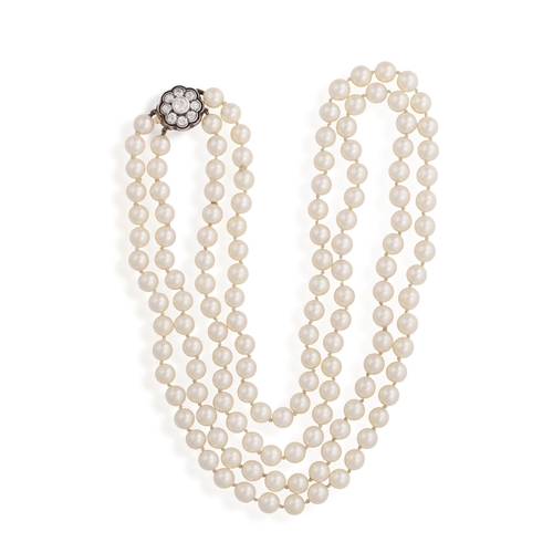 25 - A CULTURED PEARL AND DIAMOND NECKLACE  Composed of two strands of round-shaped cultured pearls of cr... 