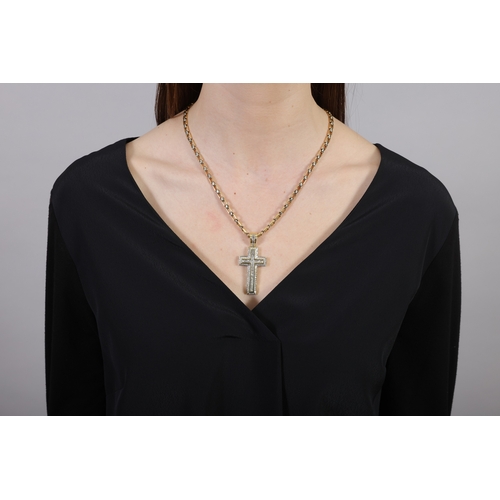 55 - A DIAMOND PENDANT AND CHAIN  The pendant designed as a cross, set with an inner cross of square-shap... 