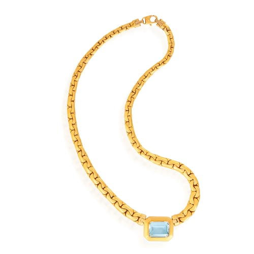 76 - TREEMME: A GOLD AND TOPAZ PENDANT NECKLACE  The horizontally-set rectangular-shaped topaz weighing a... 