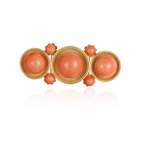 92 - A CORAL DEMI PARURE AND A NECKLACE  Comprising: a hinged bangle, a brooch, a pair of ear clips and a... 