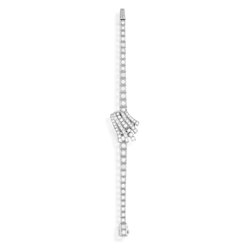 101 - A LADY'S DIAMOND COCKTAIL SECRET WATCH, CIRCA 1955  The 10-jewel manual wind movement, with central ... 