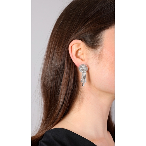 103 - A PAIR OF DIAMOND PENDENT CLIP EARRINGS, FRENCH, CIRCA 1955  Each surmount designed as a stylised sc... 