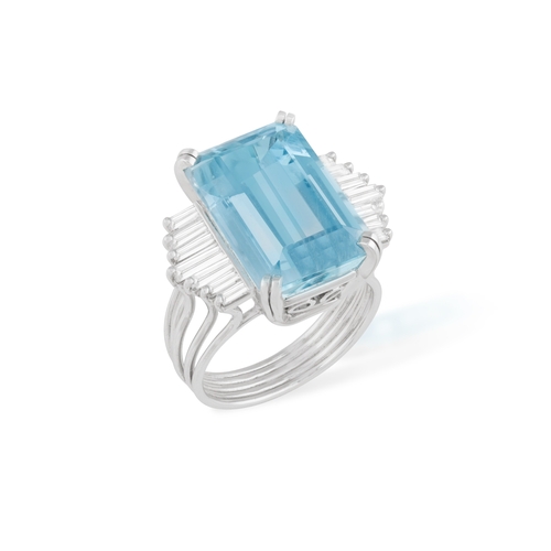 104 - A FINE AQUAMARINE AND DIAMOND RING, FRENCH, CIRCA 1960  The raised and elongated rectangular-cut aqu... 
