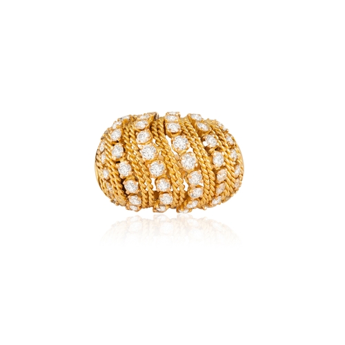 118 - A DIAMOND RING  Of openwork bombé design, set with a series of brilliant-cut diamonds between ropetw... 