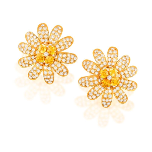 120 - MORONI: A PAIR OF SAPPHIRE AND DIAMOND EARRINGS  Each designed as a daisy, petals pavé-set with bril... 