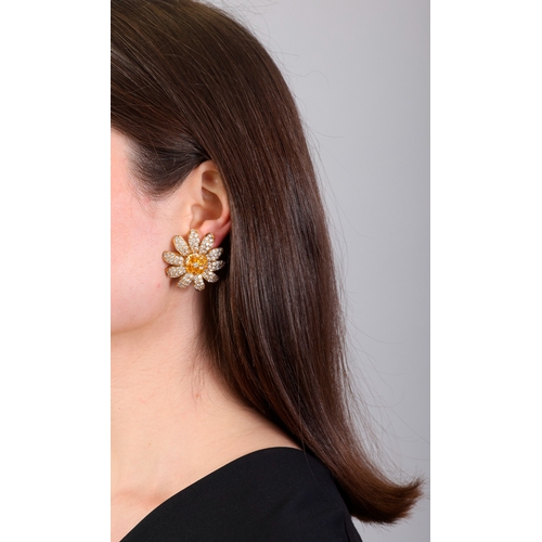 120 - MORONI: A PAIR OF SAPPHIRE AND DIAMOND EARRINGS  Each designed as a daisy, petals pavé-set with bril... 