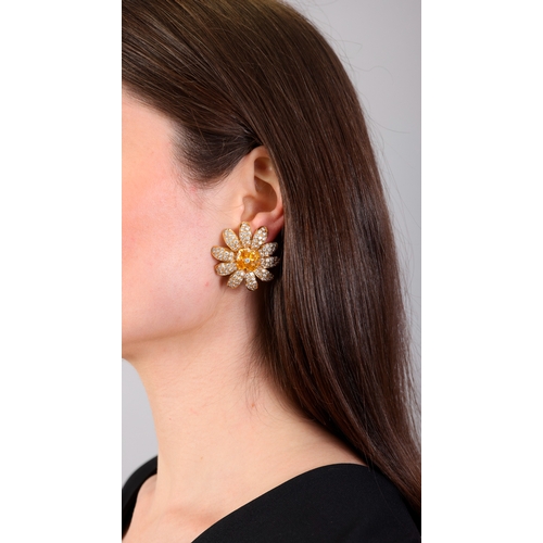 120 - MORONI: A PAIR OF SAPPHIRE AND DIAMOND EARRINGS  Each designed as a daisy, petals pavé-set with bril... 