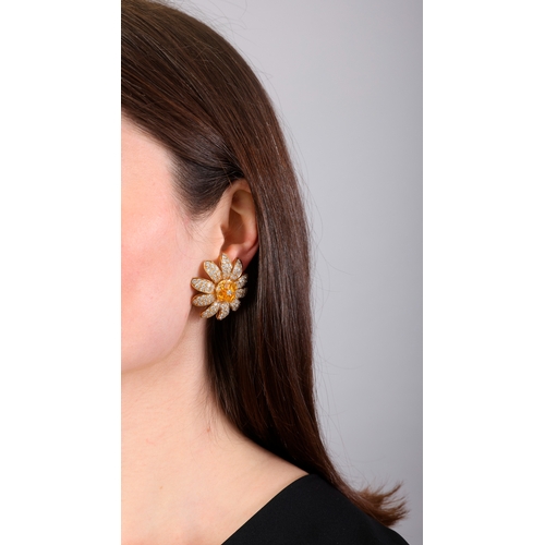 120 - MORONI: A PAIR OF SAPPHIRE AND DIAMOND EARRINGS  Each designed as a daisy, petals pavé-set with bril... 