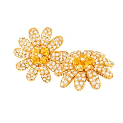 120 - MORONI: A PAIR OF SAPPHIRE AND DIAMOND EARRINGS  Each designed as a daisy, petals pavé-set with bril... 