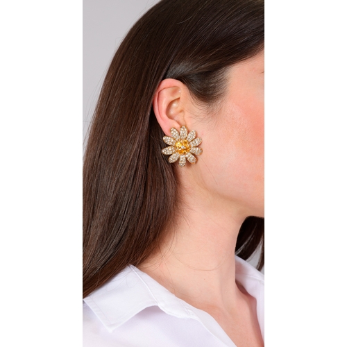 120 - MORONI: A PAIR OF SAPPHIRE AND DIAMOND EARRINGS  Each designed as a daisy, petals pavé-set with bril... 