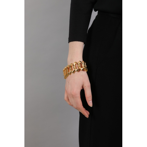 69 - A RETRO GOLD BRACELET, ITALIAN, CIRCA 1940   Composed of a continuous row of fancy-shaped openwork m... 