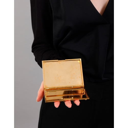 82 - HAST: A MID-20TH CENTURY GOLD CIGARETTE CASE  Of large rectangular form, all-over reeded decoration ... 