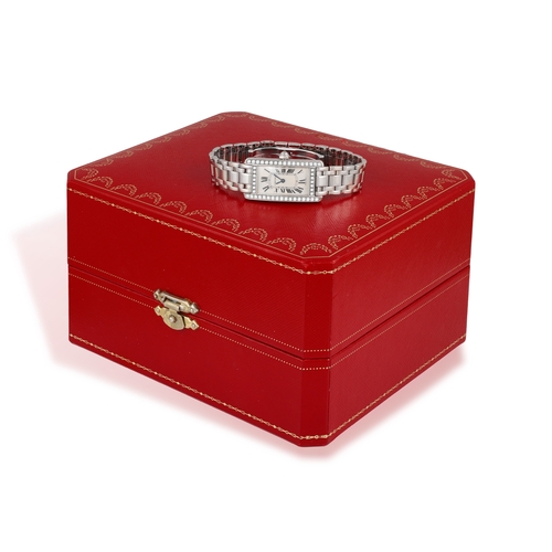 87 - CARTIER: A LADY'S 18K GOLD AND DIAMOND-SET 'TANK AMÉRICAINE' BRACELET WATCH  The 4-jewel Cal-157 qua... 