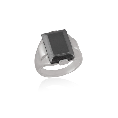 89 - A HEMATITE AND SILVER RING, CIRCA 1940  Composed of a rectangular-shaped polished hematite, set betw... 
