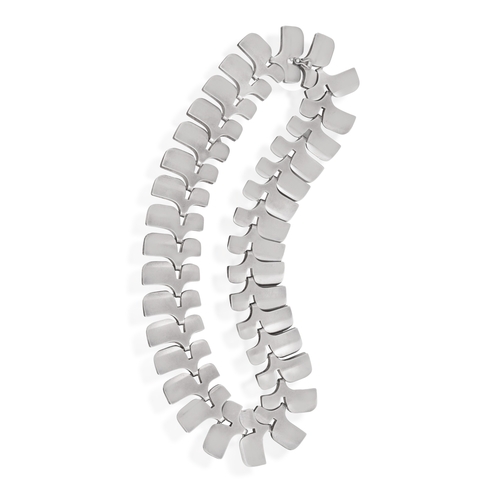 91 - GEORG JENSEN, DESIGNED BY IBE DAHLQUIST: A SILVER NECKLACE, CIRCA 1960  Composed of fancy fold-over ... 