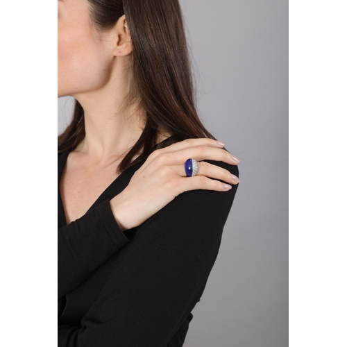 95 - M. GÉRARD: A COLLECTIBLE LAPIS LAZULI AND DIAMOND DRESS RING, CIRCA 1975  Of bombé design, the front... 