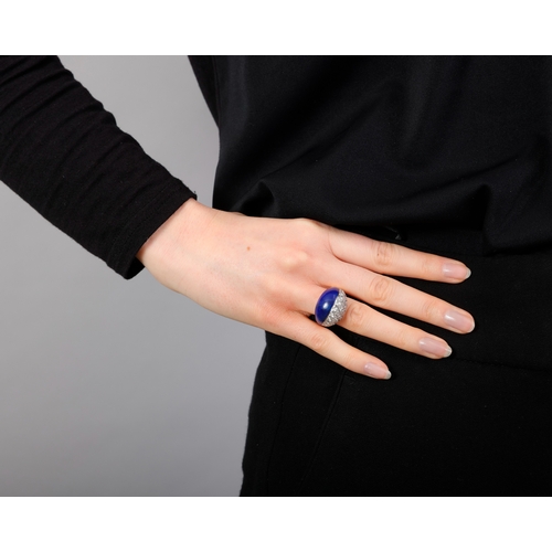 95 - M. GÉRARD: A COLLECTIBLE LAPIS LAZULI AND DIAMOND DRESS RING, CIRCA 1975  Of bombé design, the front... 
