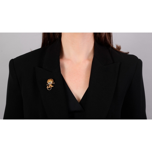 98 - VAN CLEEF & ARPELS: A GEM-SET AND DIAMOND 'LION EBOURIFFÉ' NOVELTY BROOCH, CIRCA 1960  In the form o... 
