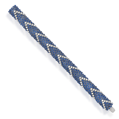 99 - AN ELEGANT SAPPHIRE AND DIAMOND BRACELET, ITALIAN, CIRCA 1960  Of fine articulated bombé design, set... 