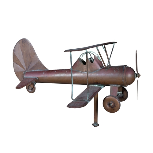 A COPPER AND WROUGHT IRON AIRPLANE WEATHER VANE, the propeller plane ...
