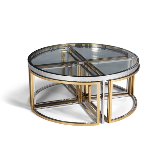 103 - TABLE  A gilt metal and chrome circular glass-topped coffee table with a nest of four tables. Italy,... 