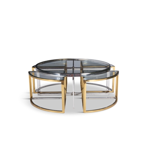 103 - TABLE  A gilt metal and chrome circular glass-topped coffee table with a nest of four tables. Italy,... 
