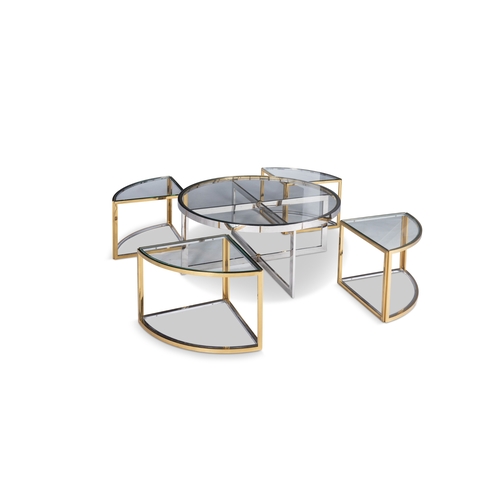 103 - TABLE  A gilt metal and chrome circular glass-topped coffee table with a nest of four tables. Italy,... 