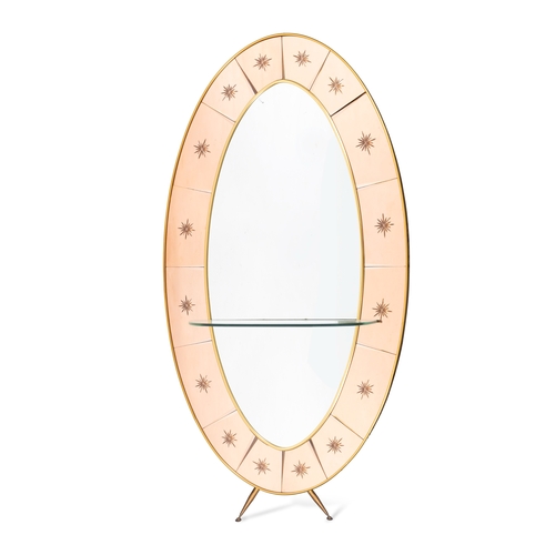 104 - CRYSTAL ARTE  Oval brass framed mirror, on two brass feet with a glass shelf, by Crystal Arte. Italy... 