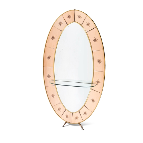 104 - CRYSTAL ARTE  Oval brass framed mirror, on two brass feet with a glass shelf, by Crystal Arte. Italy... 