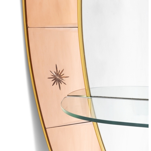 104 - CRYSTAL ARTE  Oval brass framed mirror, on two brass feet with a glass shelf, by Crystal Arte. Italy... 